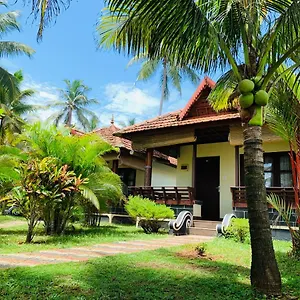 Maadathil Cottages Resort